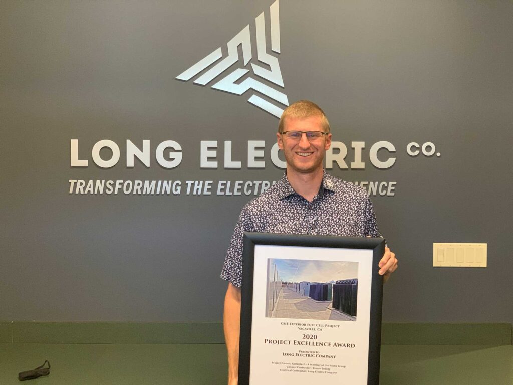 Jordan Long holds the award for the 2020 NorCal NECA Project Excellence for work on the GNE Fuel Cell project