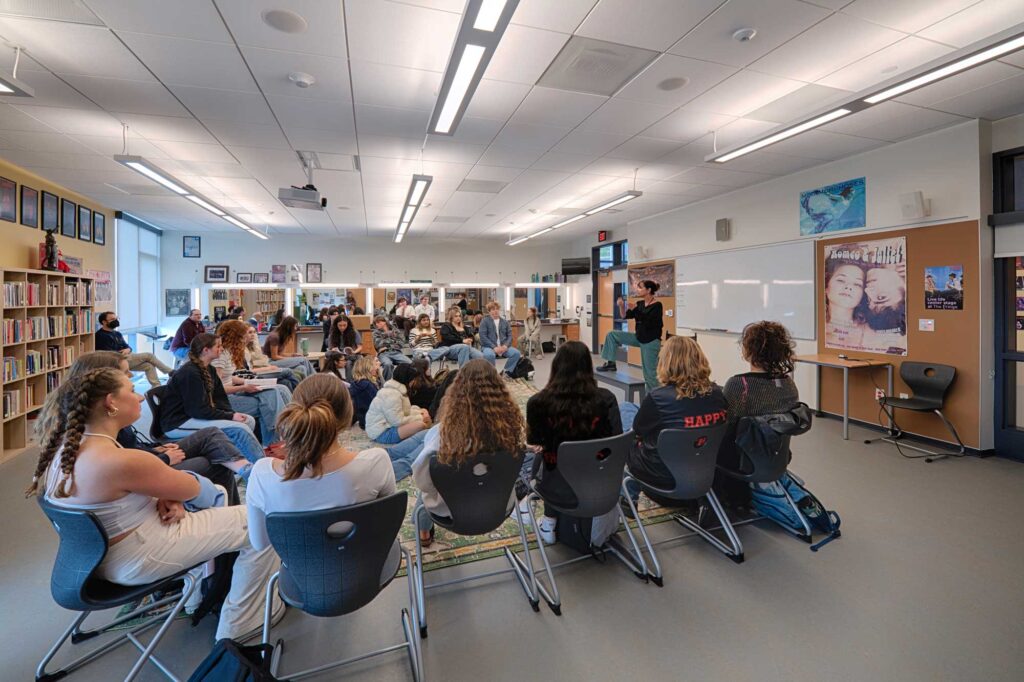 a group of Sonoma Academy Performing Arts Center students sit in chairs in a classroom